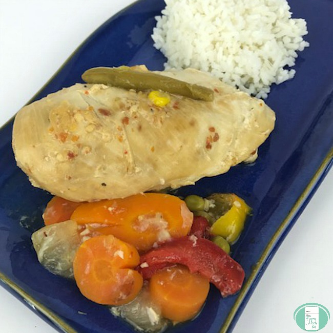 close up of Instant Pot chicken with veggies and rice