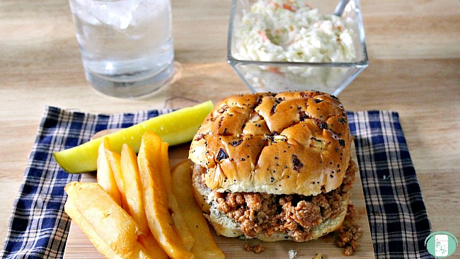 Turkey Sloppy Joe's with sides of fries, pickles and potato salad