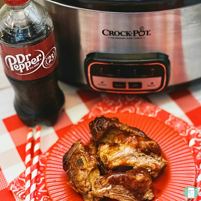 close up of Slow cooker with Dr Pepper and ribs