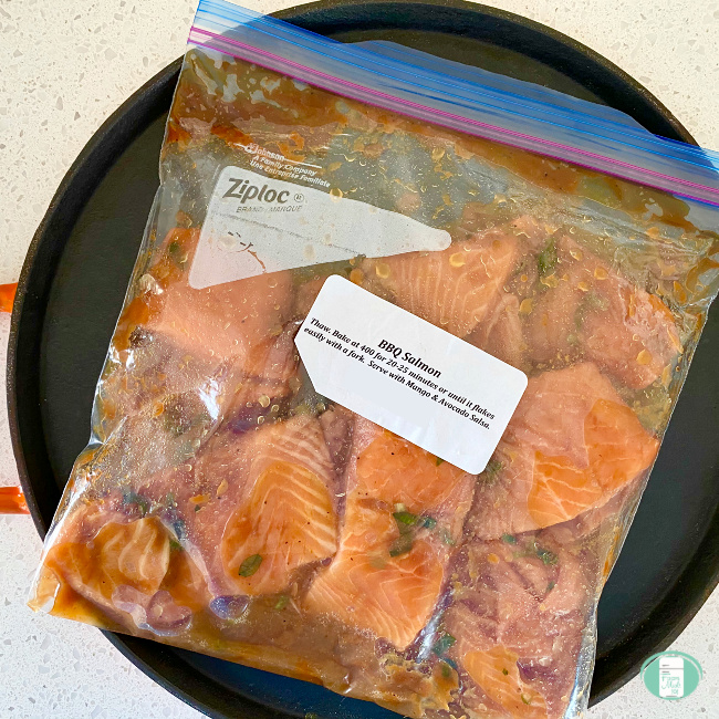freezer bag with BBQ salmon in it