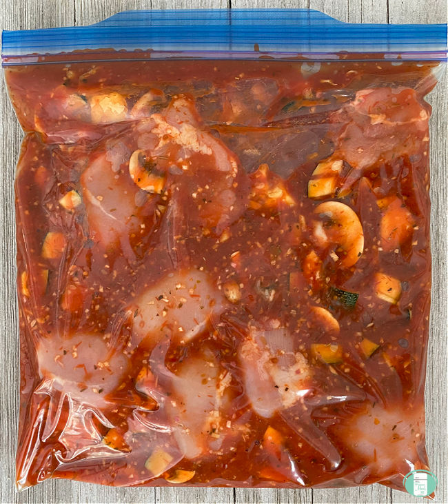 freezer bag with Italian chicken, ready to be baked