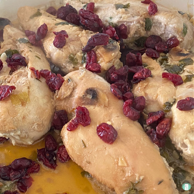 chicken topped with cranberries