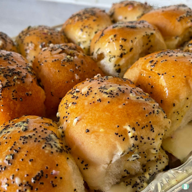 buns covered in poppy seed dressing