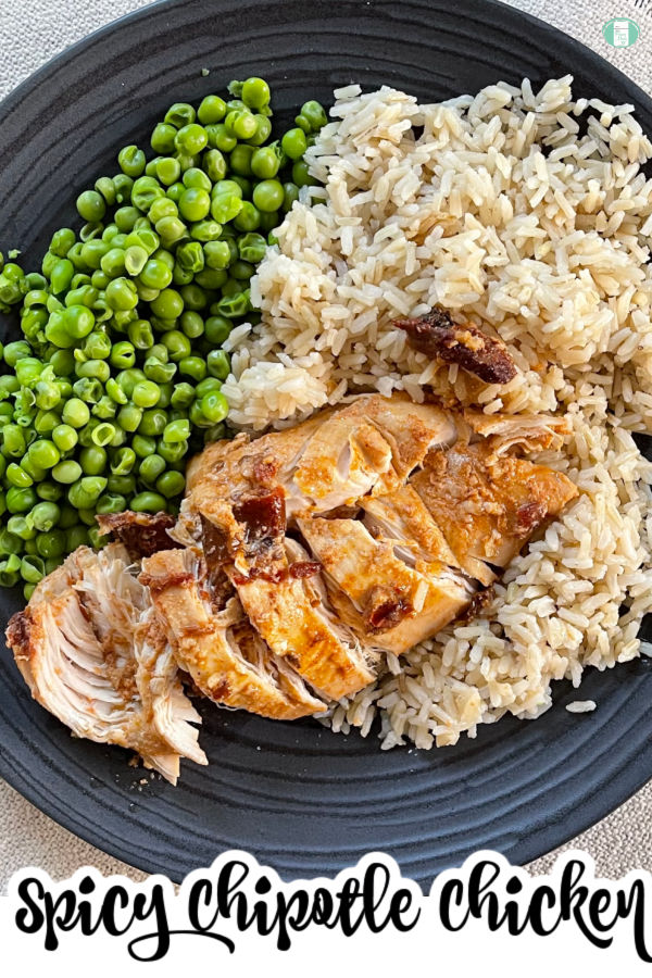 chipotle chicken on rice next to green peas 