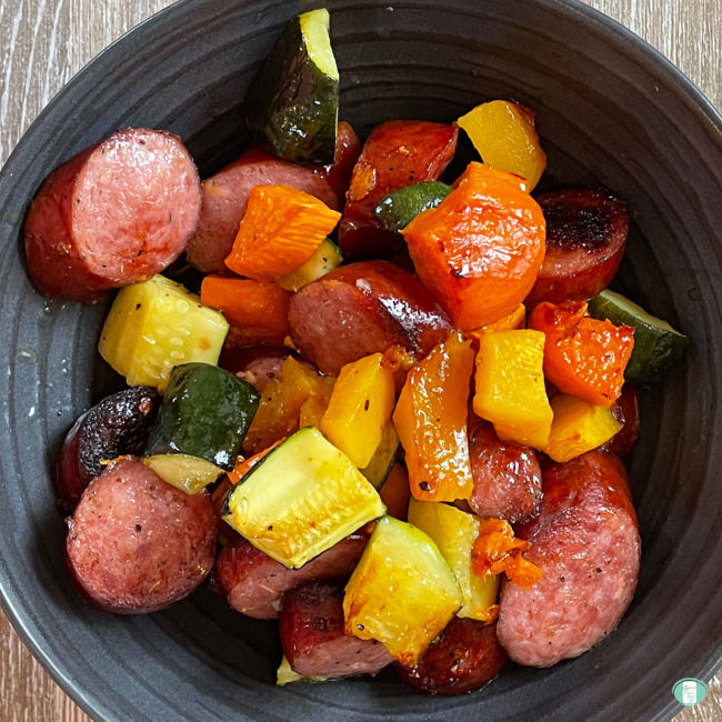 sliced sausage and vegetable cubes in a bowl