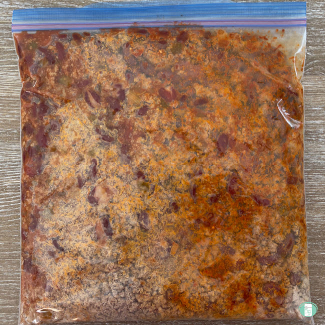 clear bag filled with ground beef and beans