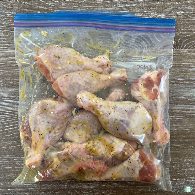 chicken drumsticks in a clear bag