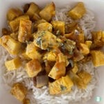 cubes of chicken on white rice