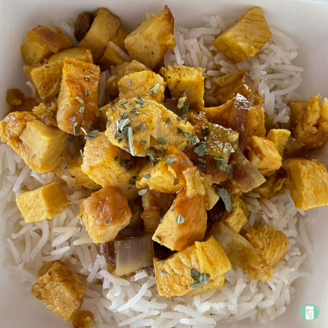 cubes of chicken on white rice