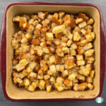 square dish with bread cube stuffing