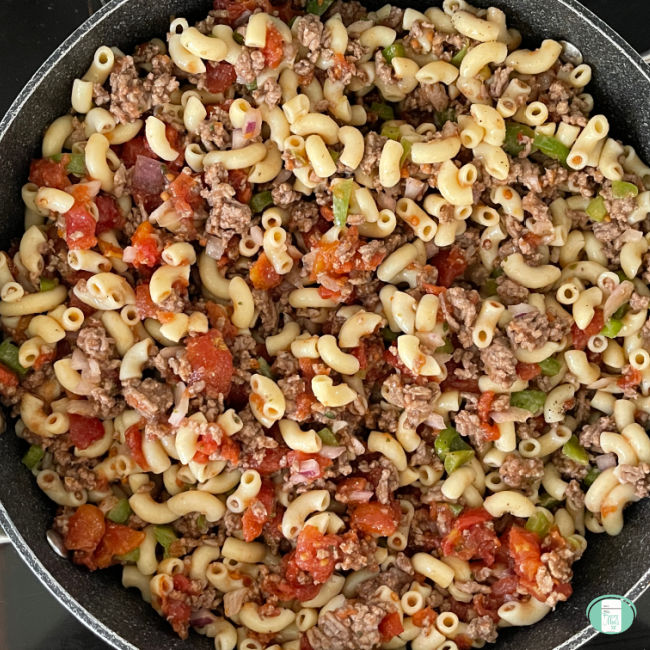 skillet with macaroni, ground beef, and tomatoes