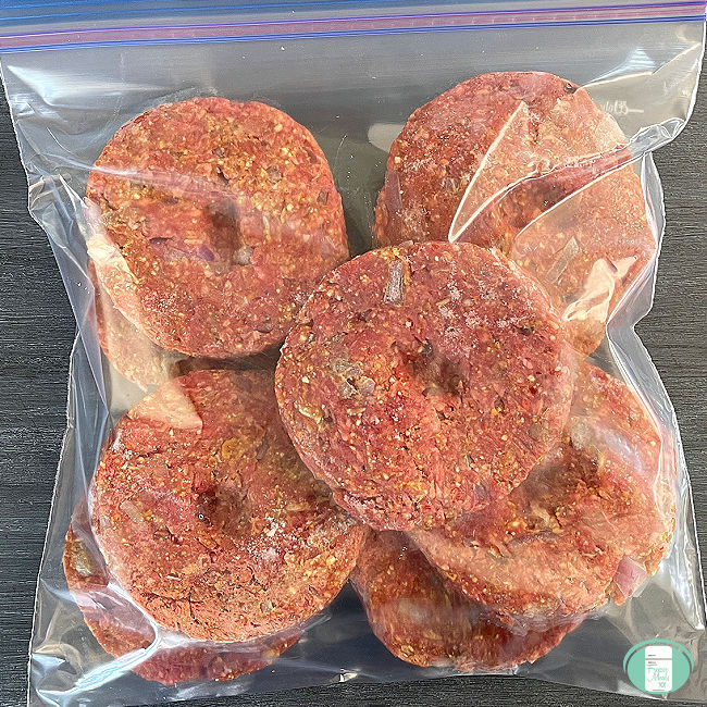 homemade burger patties in a clear freezer bag