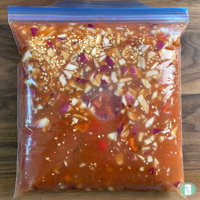 clear bag with vegetable soup in it