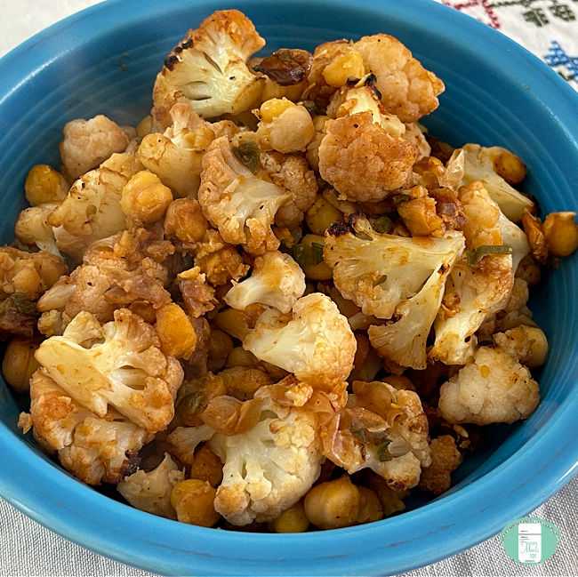 blue bowl with cauliflower and chickpeas
