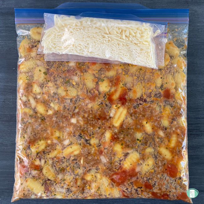Ingredients for Gnocchi Sausage Skillet in a freezer bag with the cheese in a separate bag.