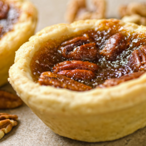 Close up shot of a pecan butter tart