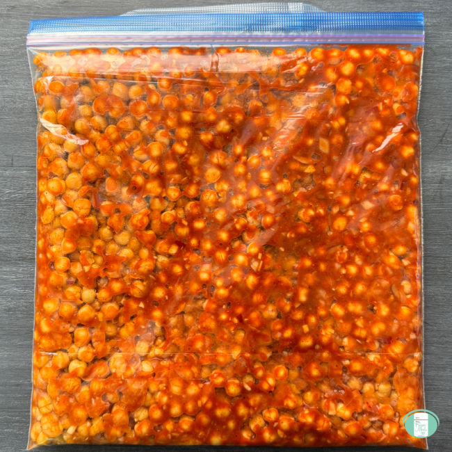 Freezer bag with all of the ingredients for buffalo chickpeas.