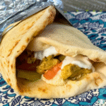 pita wrapped around chicken, tomatoes, tzatziki wrapped in foil