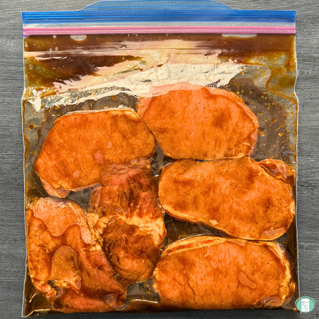 All of the ingredients for Sweet and Spicy pork in a freezer-quality bag marinating.