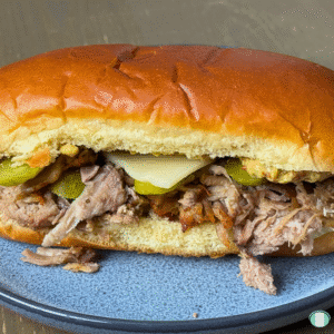Cuban Mojo Pork Sandwich on a blue plate.