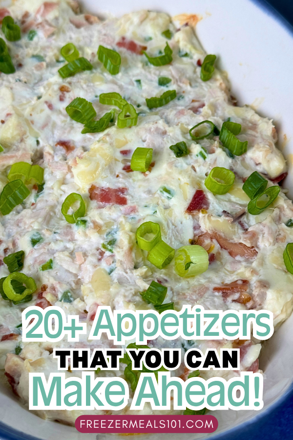 creamy hot dip with bacon and sliced green onions visible