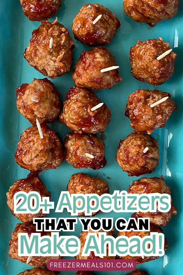 meatballs on toothpicks on a teal plate