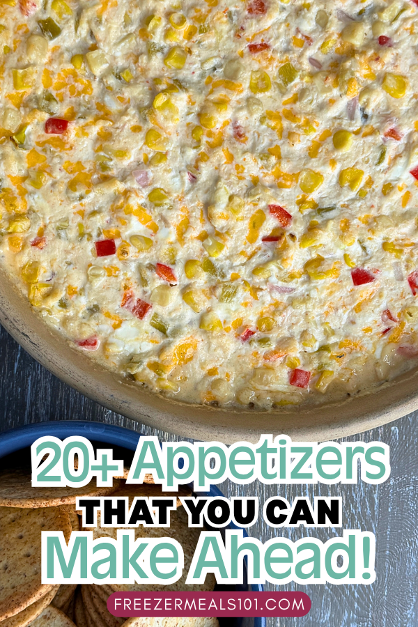hot dip with corn, cheese, and red pepper visible