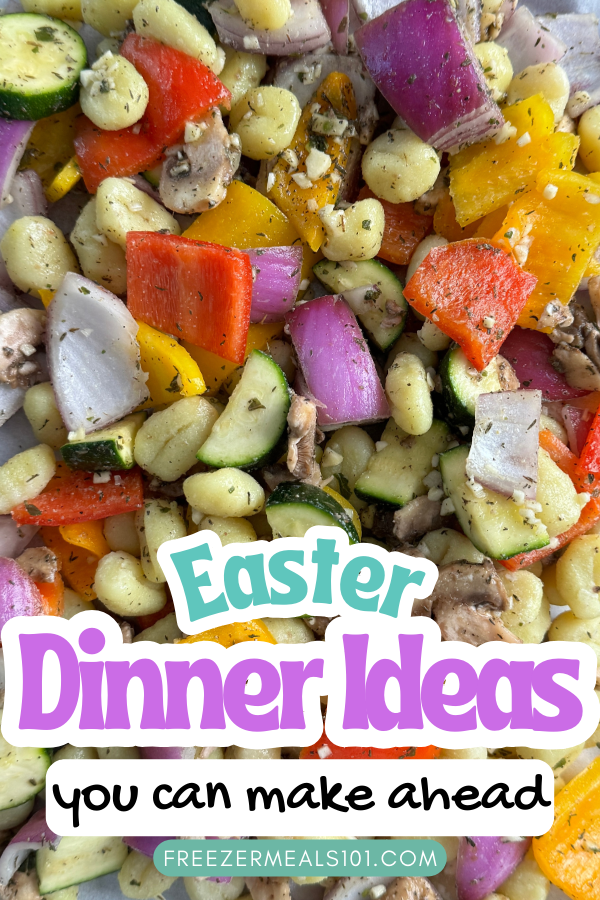 red and yellow peppers, purple onions, zucchini, and gnocchi on a sheet pan