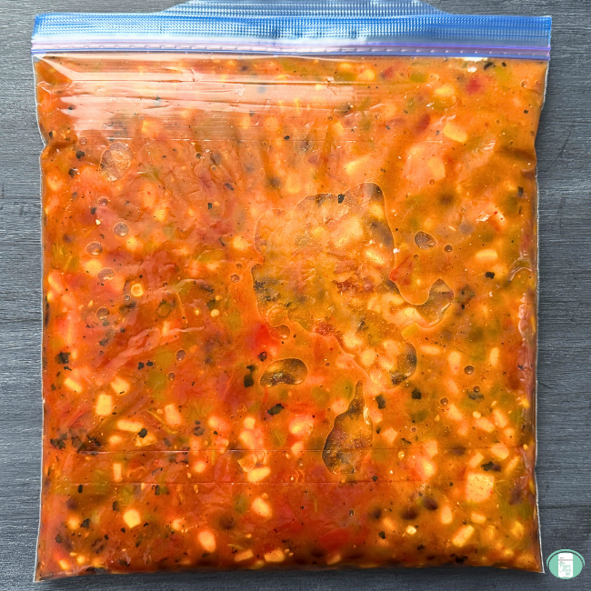 Enchilada Orzo in freezer bag.