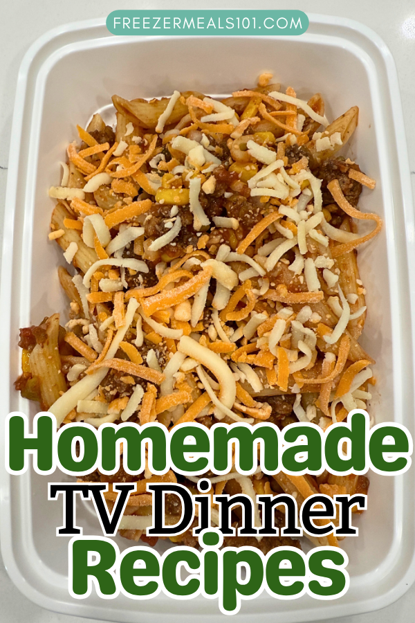 penne pasta in meat sauce with shredded cheese on top in a container
