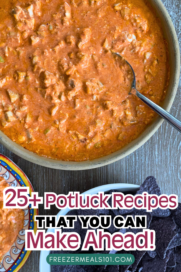 bits of chicken in sauce in a bowl with a spoon next to blue corn tortilla chips